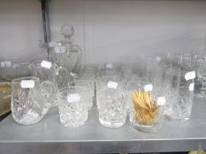 A CUT GLASS SQUARE DECANTER, THREE CUT GLASS JUGS, IN SIZES, AND 22 CUT GLASS TUMBLERS VARIOUS (26)