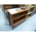 SMALL MODERN TWO TIER OPEN BOOKCASE WITH DRAWER BELOW, AND A NEST OF THREE MAHOGANY OBLONG COFFEE