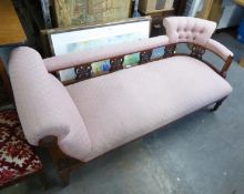A VICTORIAN RED WALNUT CHAISE LONGUE, HAVING UPHOLSTERED HEAD REST, BACK AND SEAT IN PINK FABRIC