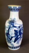 MODERN ORIENTAL BLUE AND WHITE PORCELAIN VASE, of rouleau form, painted with figures riding a dragon
