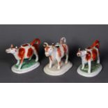 NINETEENTH CENTURY STAFFORDSHIRE POTTERY COW CREAMER, with burnt orange sponged coat, lacks cover,