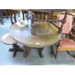 OAK CIRCULAR CENTRE TABLE WITH 'X' SHAPED PANELLED SUPPORTS WITH FOUR PAW FEET