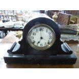 A NAPOLEON HAT SHAPED BLACK-WOOD MANTEL CLOCK WITH THREE TRAIN MOVEMENT