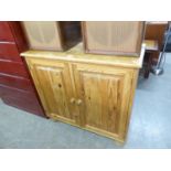 A MAHOGANY FIVE TIER OPEN BOOKCASE AND A SMALL PINE TWO DOOR CUPBOARD (2)