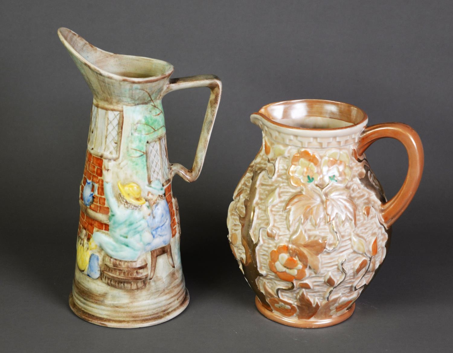 TWO H J WOOD MOULDED POTTERY JUGS, one of ovoid form, in the Indian Tree pattern, heightened in