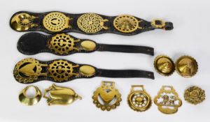 THREE LEATHER STRAPS OF AGED HORSE BRASSES AND A FEW LOOSE DITTO