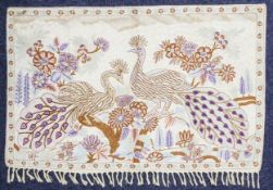 CIRCA 1990s BURMESE SILK EMBROIDERED WALL HANGING, depicting two peacocks amongst flowering
