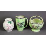 TWO PIECES OF ARTHUR WOOD ‘ASTORIA’ PATTERN GREEN LUSTRE GLAZED AND MOULDED POTTERY, comprising:
