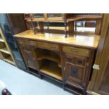 AESTHETIC MOVEMENT INCISE CARVED MAHOGANY DISPLAY SIDEBOARD, THE TALL RAISED BACK WITH TWO GLAZED