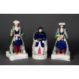 THREE NINETEENTH CENTURY STAFFORDSHIRE POTTERY FIGURES WITH SHREDDED CLAY DETAIL, comprising: A