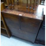 AN ANTIQUE MAHOGANY DRINKS CABINET, WITH EBONY STRINGING, LIFT-UP TOP AND FRONT, 2'3" WIDE (