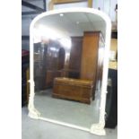 A LARGE VICTORIAN OVER-MANTEL MIRROR IN PAINTED ROCOCO FRAME