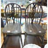 PAIR OF CHILD'S ELM SEATED WHEEL-BACK DINING CHAIRS