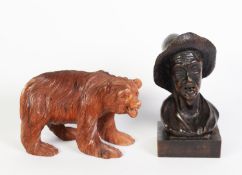 CARVED HARDWOOD BUST OF A PEASANT with open mouth showing two teeth and wearing a wide brim hat,