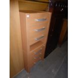 A PAIR OF MODERN BEECH THREE DRAWER BEDSIDE CHESTS