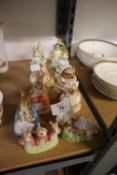 ELEVEN ROYAL ALBERT BEATRIX POTTERY CHARACTER FIGURES, TO INCLUDE; 'MRS RABBIT', 'POORLY PETER