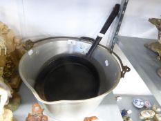 A LARGE PRESERVING PAN AND A VINTAGE CAST IRON FRYING PAN (2)