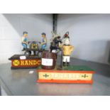 'TRICK DOG' AND 'HANDCAR', TWO PAINTED CAST IRON MONEY BOXES (2)