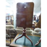 A SMALL MAHOGANY RECTANGULAR SNAP-TOP OCCASIONAL TABLE, RAISED ON TRIPOD BASE