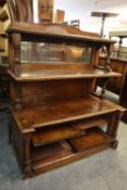 A LAMB OF MANCHESTER STYLE WALNUT BUFFET, WITH TWO OPEN SHELVES ABOVE TWO CUPBOARDS (NEEDS