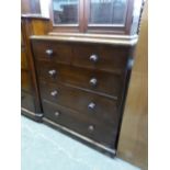 A VICTORIAN MAHOGANY CHEST OF TWO SHORT OVER THREE LONG DRAWERS WITH KNOB HANDLES, RAISED ON