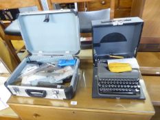 AN IMPERIAL 'GOOD COMPANION' 'MODEL T.' PORTABLE TYPEWRITER ADAPTED FOR TYPING BRAILLE AND A CASE OF