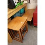 A NEST OF 3 TEAK COFFEE TABLES AND A TEAK COFFEE TABLE (2)