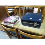 A FIDELITY ELECTRIC PORTABLE RECORD PLAYER AND A SMALL SELECTION OF LP's