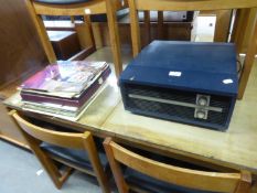 A FIDELITY ELECTRIC PORTABLE RECORD PLAYER AND A SMALL SELECTION OF LP's