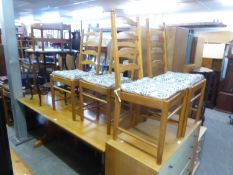 ERCOL PINE REFECTORY STYLE DINING TABLE, 6’ X 2’8”; A SET OF SIX ERCOL LADDER BACK SINGLE CHAIRS,