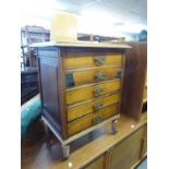 A SMALL MAHOGANY FIVE DRAWER SHEET MUSIC CABINET (1 DRAWER A.F.)