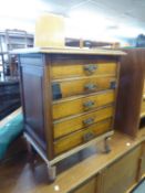 A SMALL MAHOGANY FIVE DRAWER SHEET MUSIC CABINET (1 DRAWER A.F.)