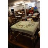 AN EARLY TWENTIETH CENTURY CAROLEAN REVIVAL WALNUTWOOD DRESSING STOOL WITH STUFF-OVER TAPESTRY