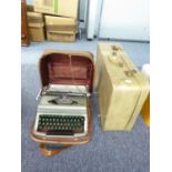 ROYAL MANUAL PORTABLE TYPEWRITER; AND A SMALL SUITCASE (2)
