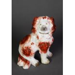 VICTORIAN STAFFORDSHIRE POTTERY MANTEL DOG, modelled with front legs away from the body and with