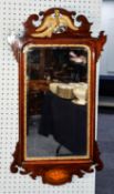 EARLY TWENTIETH CENTURY GEORGIAN STYLE MAHOGANY AND PARCEL GILT WALL MIRROR, of vertical, rounded