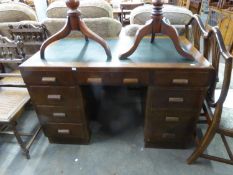 OAK ART DECO KNEEHOLE DESK WITH GREEN LEATHER INSET TOP HAVING 8 DRAWERS