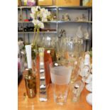 THREE LARGE PLAIN GLASS FLOWER VASES; OTHER FLOWER VASES, VARIOUS AND AN ARTIFICIAL ORCHID IN