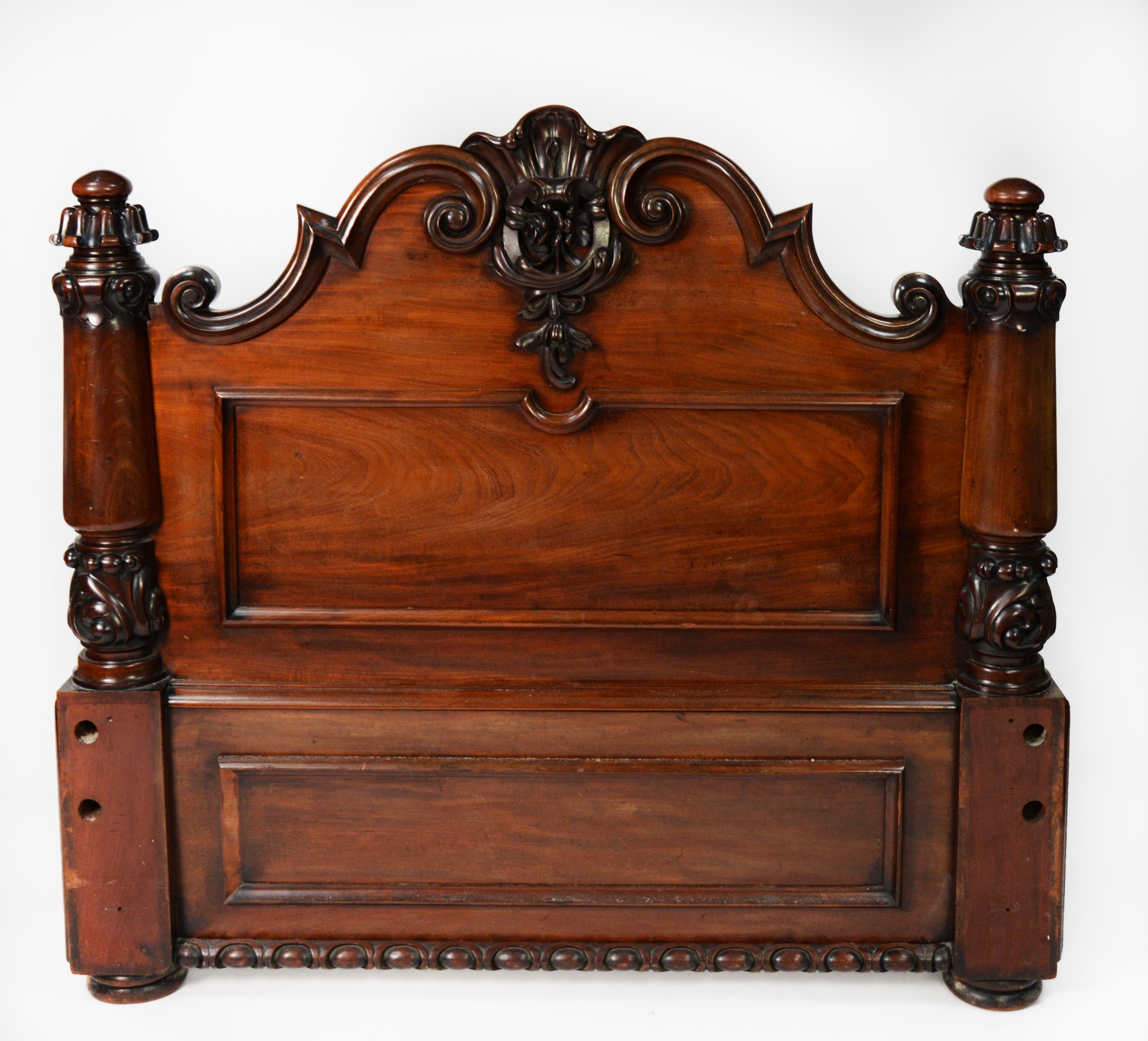 NINETEENTH CENTURY HEAVY CARVED MAHOGANY FOOTBOARD FOR A HALF TESTER BED, with well carved shell