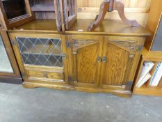 OLD CHARM STYLE OAK STEREO CABINET, HAVING LEADED GLAZED DOOR AND FAUX DOOR WITH TWO CUPBOARD DOORS