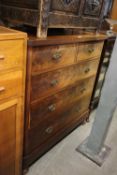 A VICTORIAN ROUNDED-CORNER CHEST OF TWO OVER THREE DRAWERS