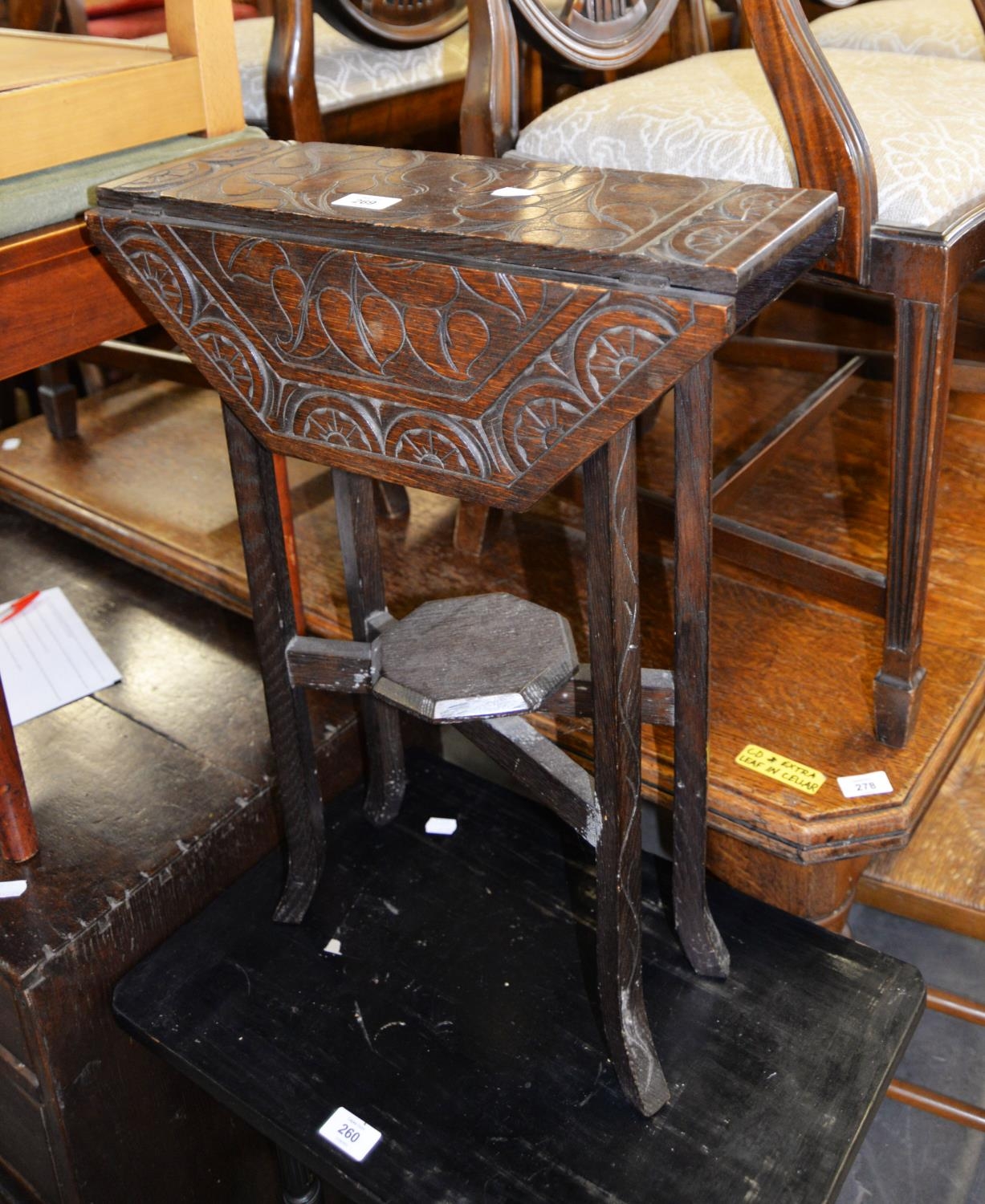 SMALL CARVED DARK OAK OCTAGONAL SUTHERLAND TABLE