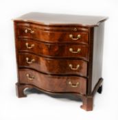 LATE VICTORIAN CHIPPENDALE REVIVAL SERPENTINE FRONTED MAHOGANY CHEST OF DRAWERS, the moulded top