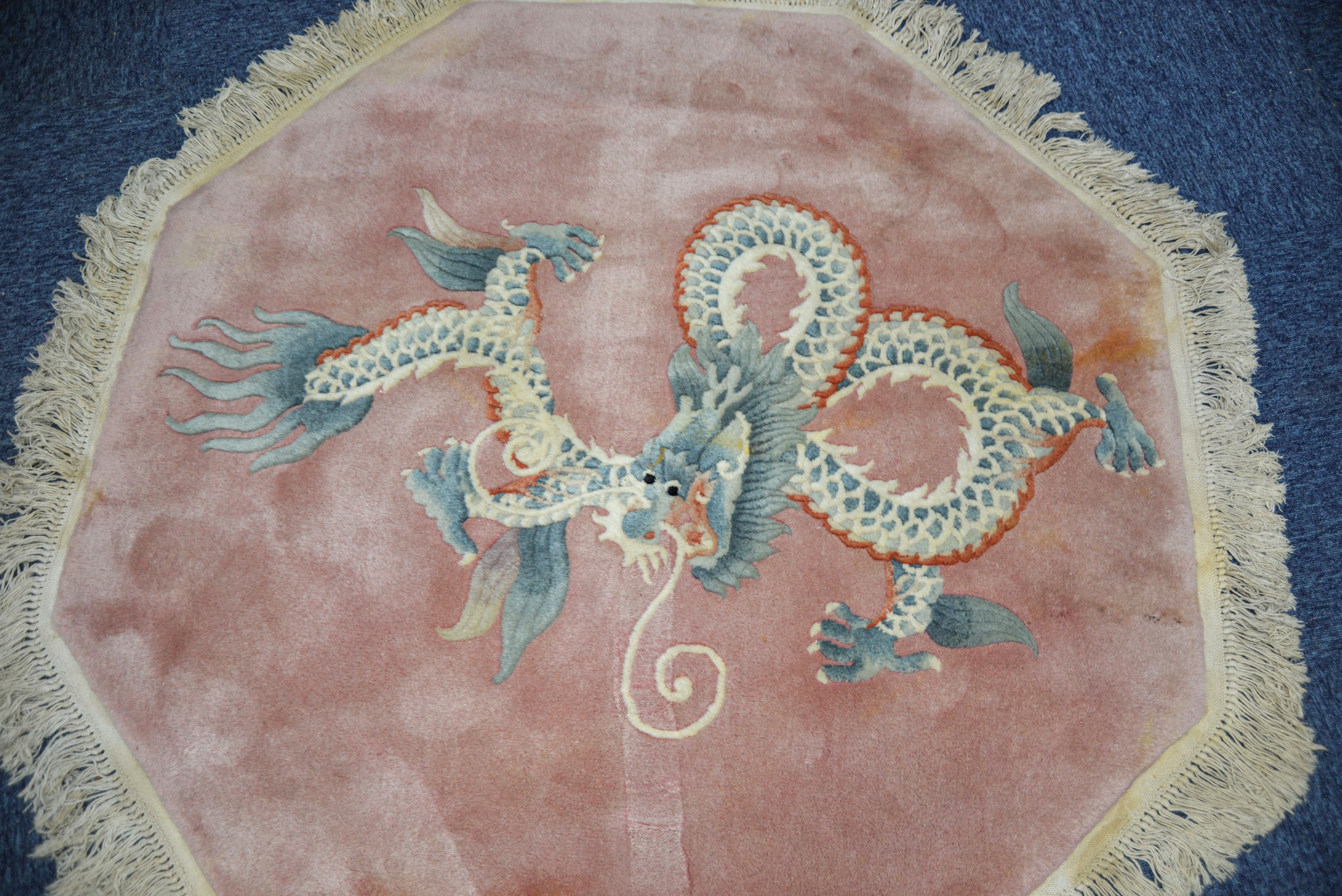HEAVY QUALITY WASHED CHINESE RUG, octagonal, plain pale pink field with large embossed and multi- - Image 2 of 3