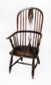 NINETEENTH CENTURY DARK STAINED ASH, ELM AND FRUITWOOD HOOP BACK WINDSOR ARMCHAIR, of typical form