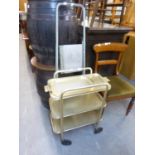 A GILT METAL THREE TIER TEA TROLLEY AND A SET ALUMINIUM PLATFORM STEPS (2)