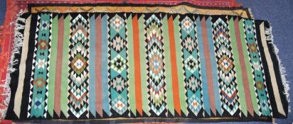 TUNISIAN FLAT WEAVE SMALL, NARROW CARPET, with a horizontal striped design with trios of plain