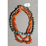 TWO GOLDEN TRANSLUSCENT CHIP AMBER BEAD NECKLACES AND A SINGLE STRAND NECKLACE OF GREEN JADITE