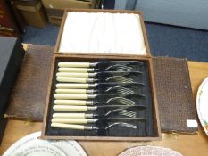 A CUTLERY CANTEEN WITH A DESSERT SERVICE OF 18 PIECES AND A CASED SET OF 6 PAIRS OF FISH EATERS