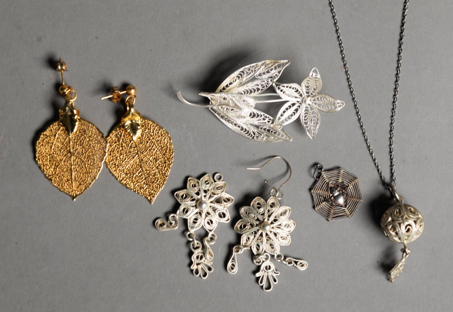 SILVER FILIGREE FLORAL SPRAY BROOCH; SILVER LONG FINE CHAIN NECKLACE AND FILIGREE GLOBE PENDANT;